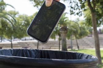 smartphone into trash